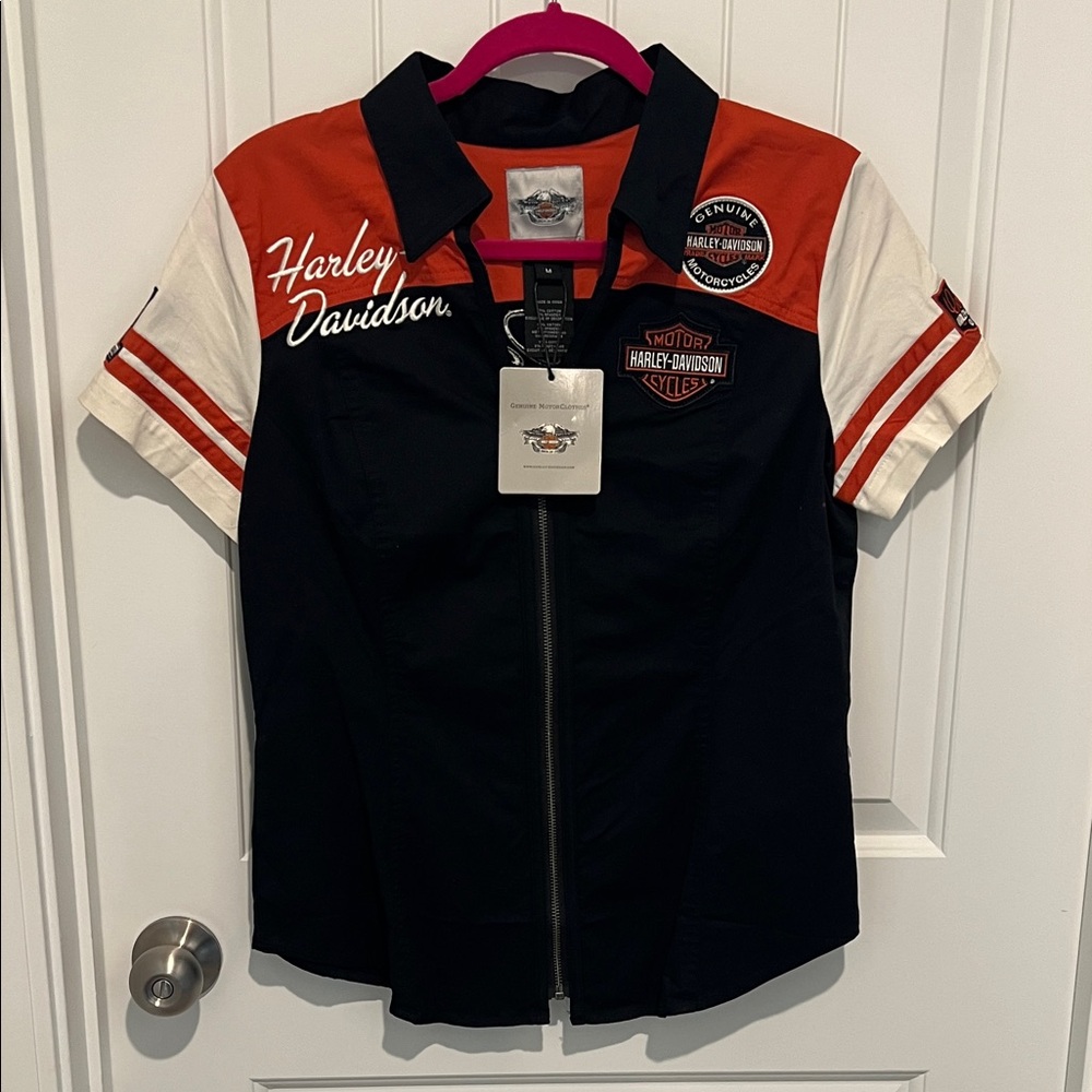 Harley Davidson women’s medium zippered shirt.